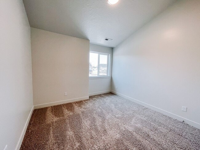 Building Photo - Brand New Idyllic Townhome in AF