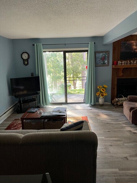 Living Room Looking Out Onto River - 7 Juniper Trl