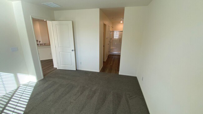 Building Photo - 2 Bedroom NEW Townhouse with Mountain Views close to the VA Hospital in North Las Vegas.