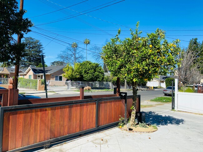 Electronic front gate / 2 off street parking spaces - 6712 Cedros Ave