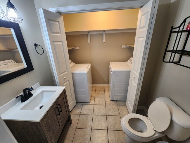 Building Photo - Two Bedroom townhome each with private baths