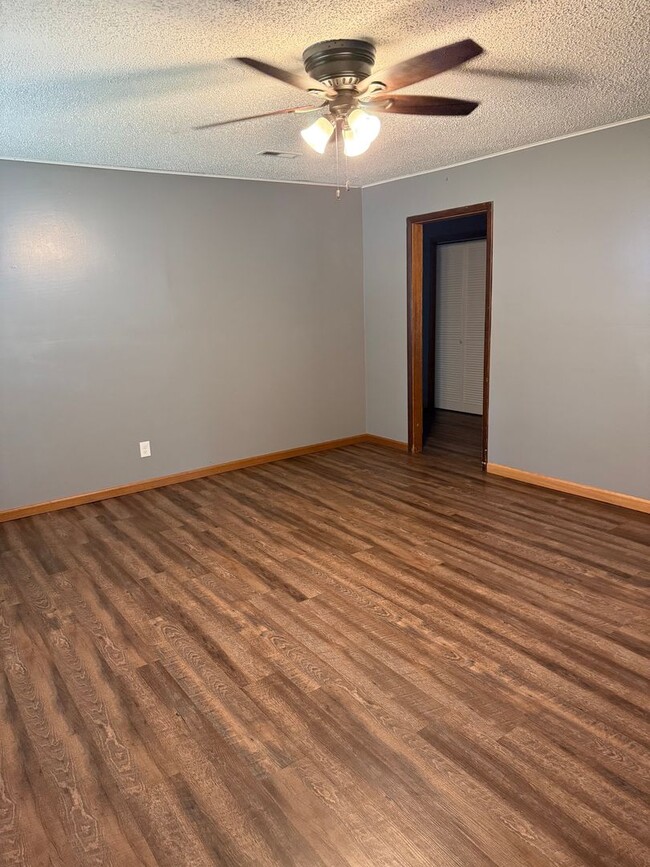 Building Photo - 3BR/1BA with overside detached garage read...