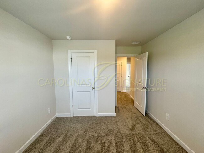 Building Photo - Beautiful New Construction Townhome in Uni...