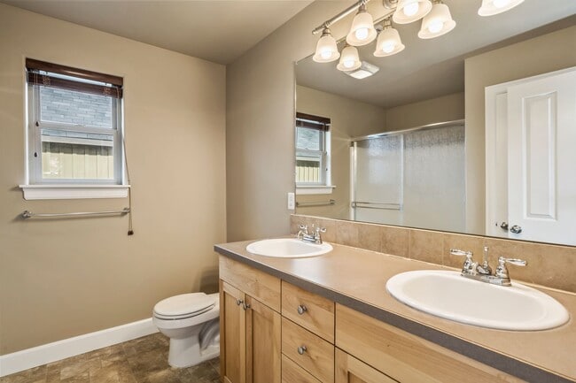Building Photo - Spacious 4-Bedroom Home with New Paint & Carpet, Fenced Yard