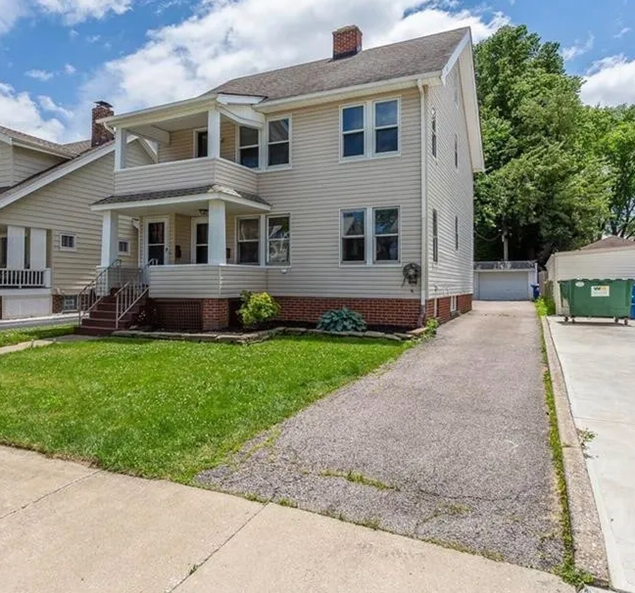 Front of home and driveway to garage and off-street parking - 14809 Leonard Ave
