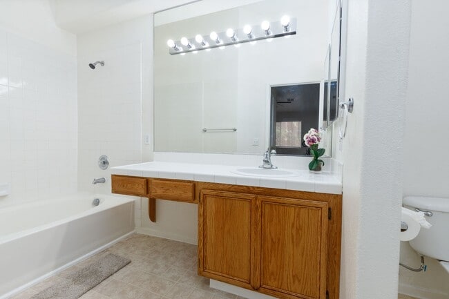 Building Photo - Refurbished upstairs two bedroom in well maintained East side gated complex