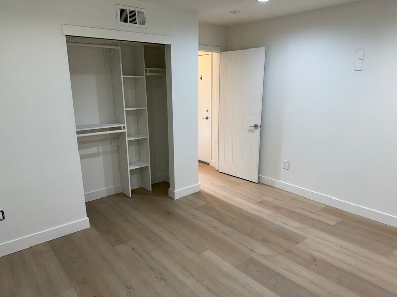 1ST BEDROOM NEW FLOORING - 646 N Serrano Ave