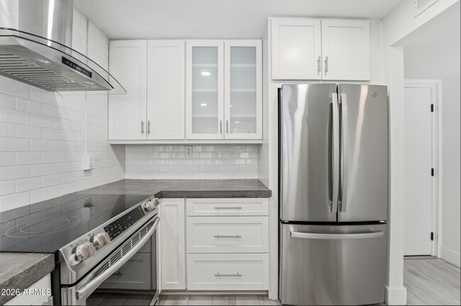 Building Photo - 7625 E Camelback Rd