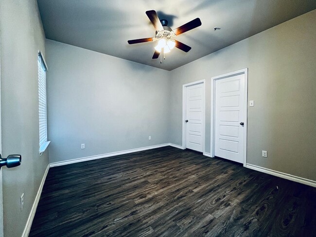 Building Photo - 4 Private Suites • Walk to Texas Tech • Modern Finishes