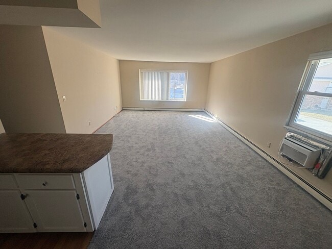 Building Photo - Spacious 2BR/1.5BA 2nd Floor Apartment in Brown Deer – Heat & Hot Water Included, Pool & Undergro...