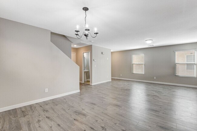Building Photo - Spacious 3 bedroom home with large yard in...