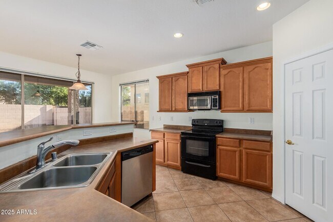 Building Photo - 7013 S 57th Ave