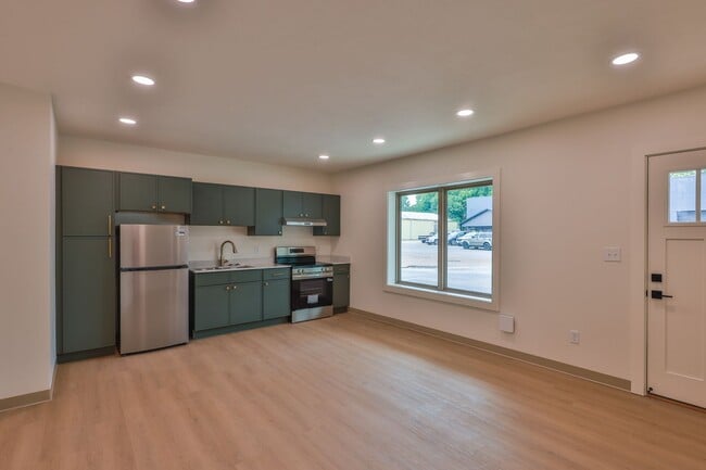 Building Photo - Modern Remodel with Designer Finishes | All Utilities Included