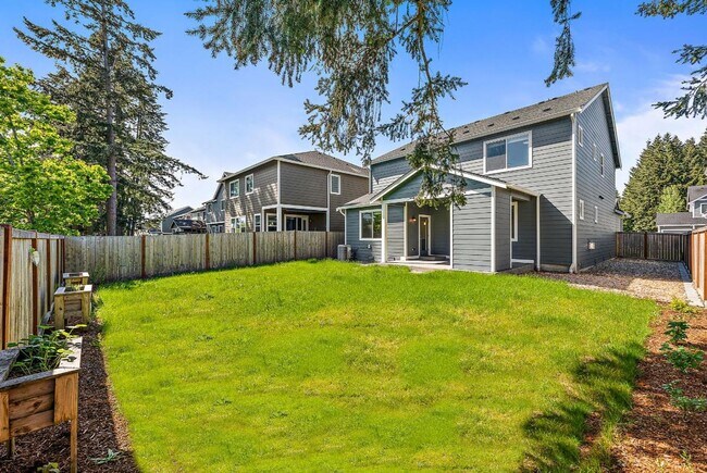 Building Photo - Modern 4-Bedroom Yelm Home with Covered Patio, Outdoor Fireplace & Office/Flex Space!
