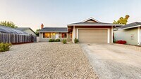 Building Photo - Bright 4 Bedroom 2 Full Bathroom Home with...