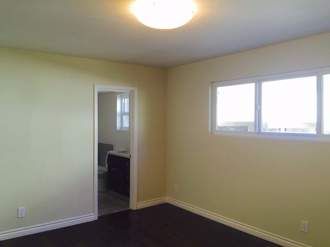 Building Photo - 1 Bedroom/2 Bath + Family Room/Den/Office ...