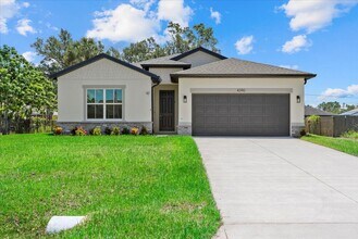 Building Photo - Spacious 4/3 Brand NEW Construction Home O...