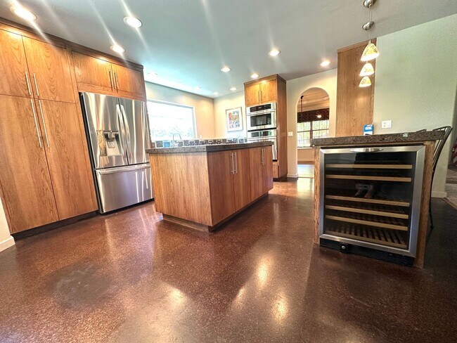 Building Photo - Beautiful 3-Bedroom Home with Open Floor Plan & Private Backyard