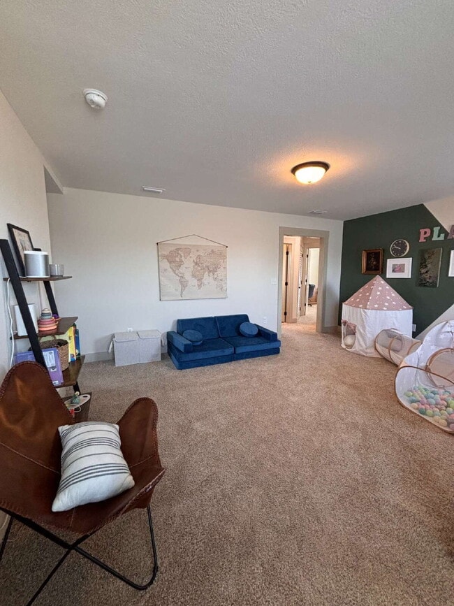 Building Photo - Need Space?  How about 5 bedrooms, 2.5 baths + an extra bonus area upstairs so that the kids can ...