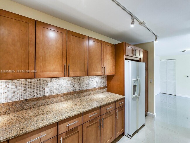 Building Photo - 8390 SW 72nd Ave