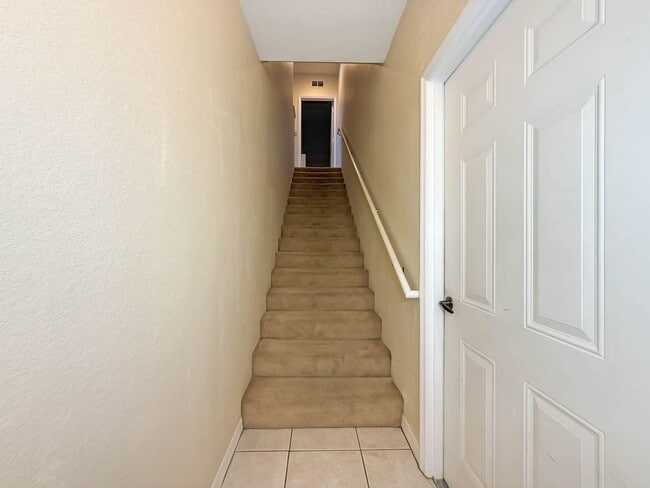 Building Photo - Beautiful 3-Bedroom Condo with 2-Car Garag...