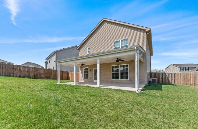 Building Photo - 4-Bedroom with Fenced Yard