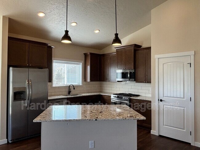 Building Photo - 9070 W Songwood Dr