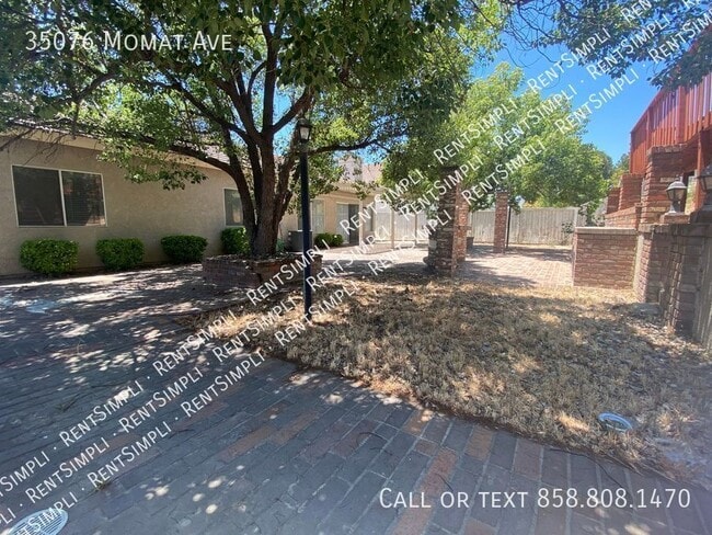 Building Photo - 35076 Momat Ave