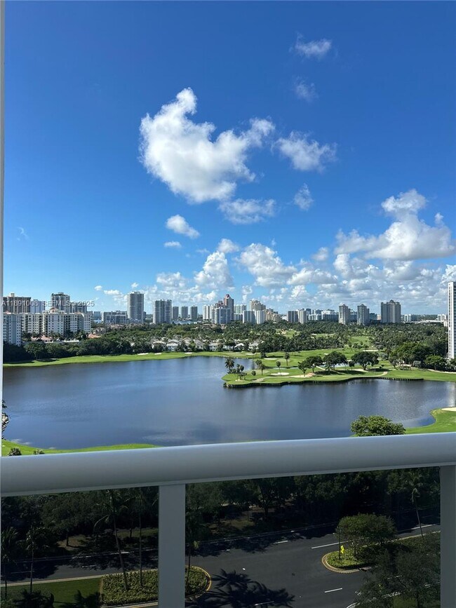 Building Photo - 3675 N Country Club Dr