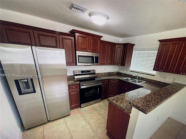 Primary Photo - 5881 NW 32nd Ave