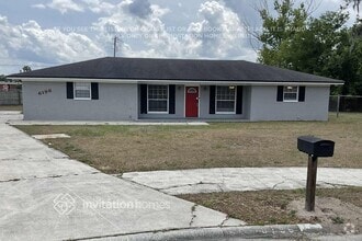 Building Photo - 6196 Raintree Rd