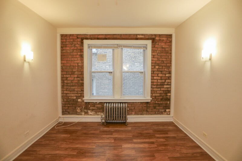 Building Photo - 6916 N Lakewood Ave
