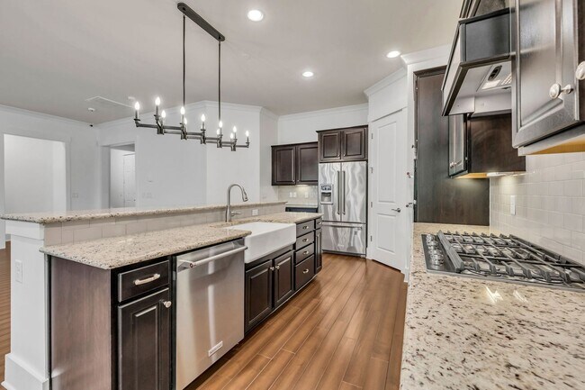 Building Photo - Beautifully maintained and move-in ready, this stunning mostly one-level all-brick home