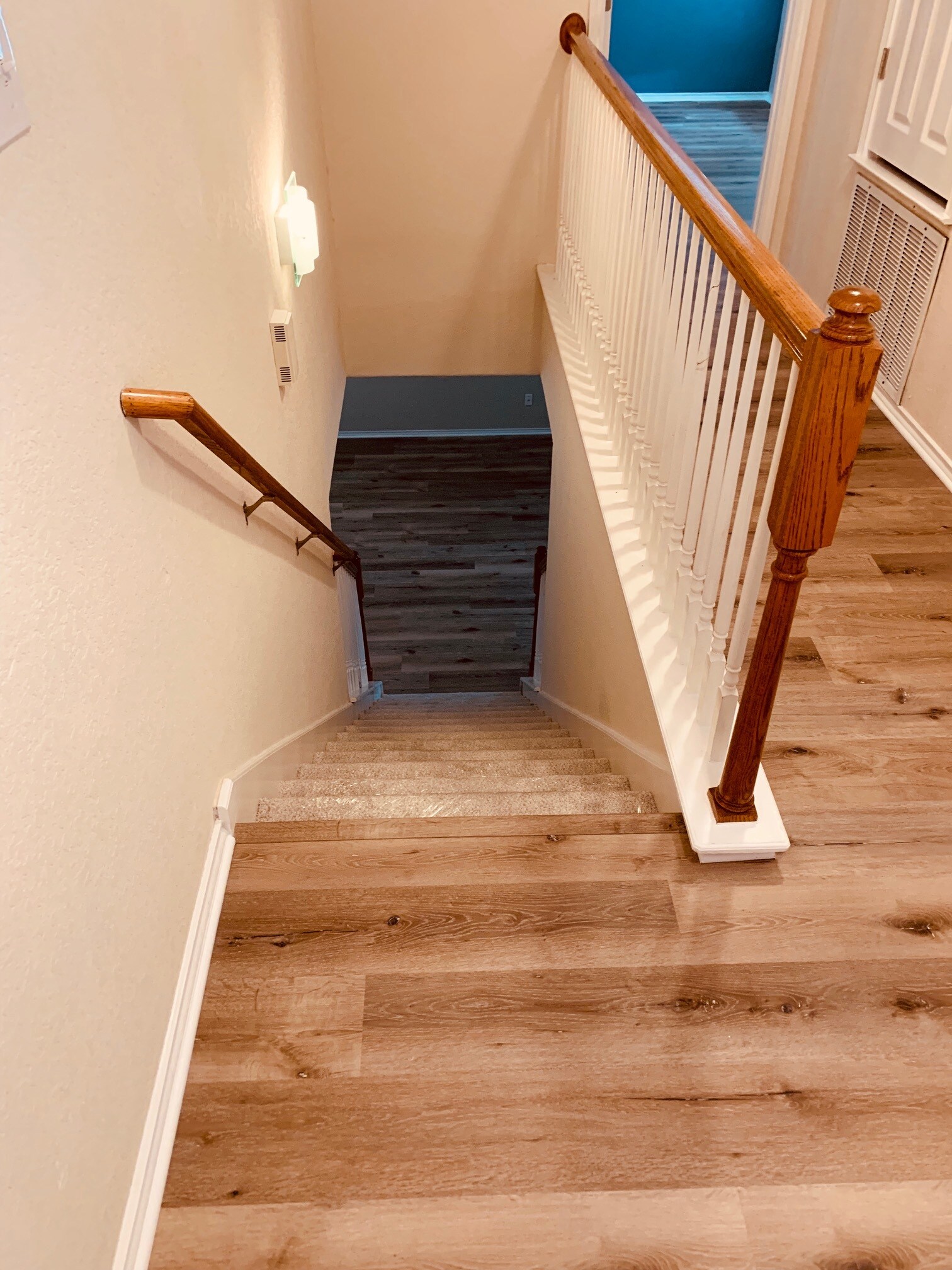 Stairs looking down to living area - 10219 Roseangel Ln