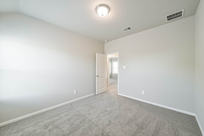 Building Photo - Experience luxury in this never-lived-in Beazer home located in the desirable Montgomery Ridge co...