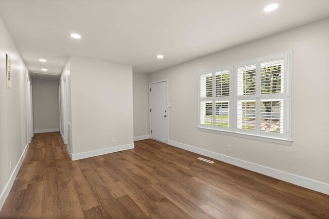 Building Photo - Spacious Split-Level Living with Dual Fireplaces & Expansive Deck