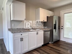 Building Photo - AVAILABLE NOW!! 3 Bedroom Home with Huge Y...