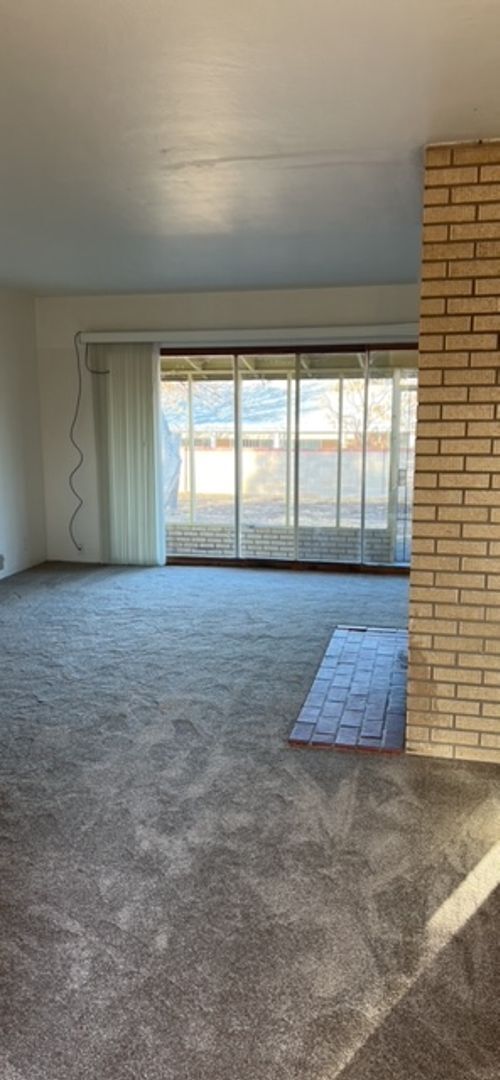 Building Photo - Nice 3 Bedroom 2 Bathroom, 2 Living areas. NE Heights, with plenty of room to roam inside and out