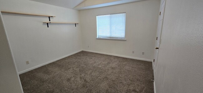Building Photo - 8084 N Ridge Loop E