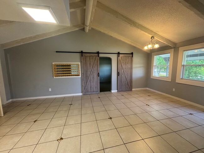 Building Photo - Charming 3-Bed Home in Hayden Lake — Spacious Lot & Attached Garage!