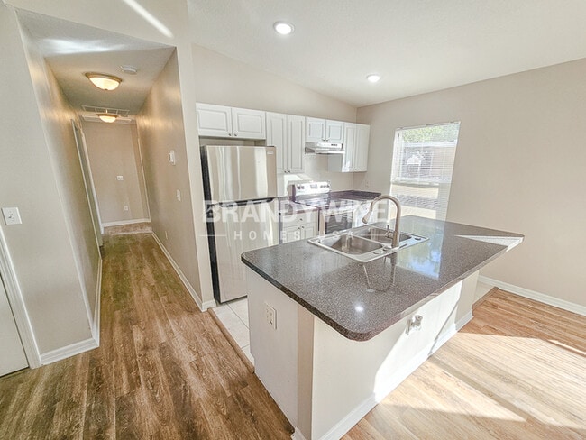 Building Photo - NEW Lower Rental Rate Leasing Special: Mar...