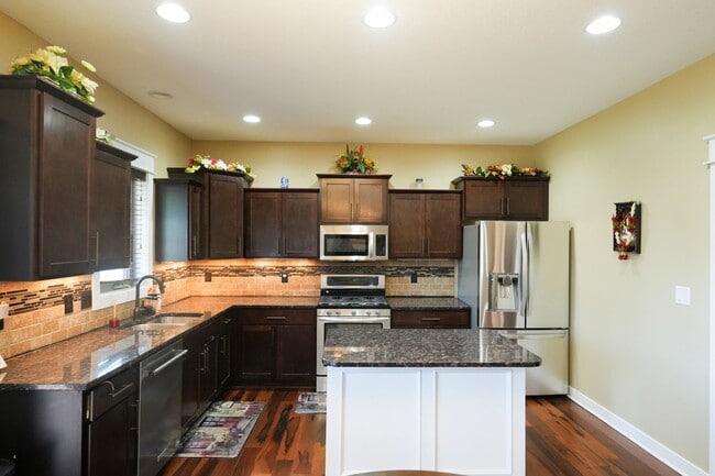 Building Photo - "Luxury Ranch Living: Your Dream Home with Furnished Basement in Urbandale"