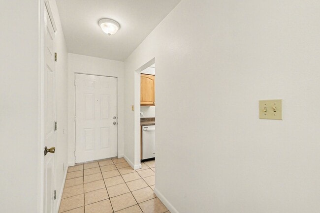 Building Photo - Must see 1st floor, end unit with lots of natural light in St Lucie Gardens.
