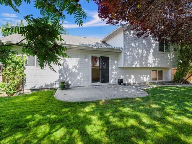 Building Photo - June Rent Free!!  Move Today!  Four Bedroom, Three Bath Home with Beautiful Backyard, Two Car Gar...