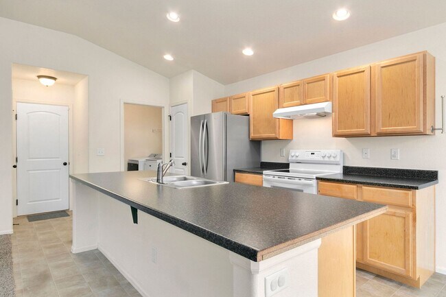 Building Photo - RainDance Resort-Style Living with 5 Bedroom, 3 Bathroom Ranch Home!