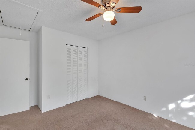 Building Photo - Comfortable & Spacious 3BR Condo with Built-In Closets and Backyard Patio in Tavares Community