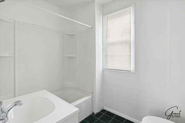 Building Photo - 8440 Orchard Ave