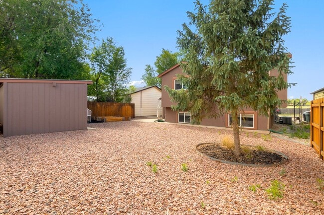 Building Photo - Updated 4-Bedroom Home with Central A/C & Xeriscaped Yard