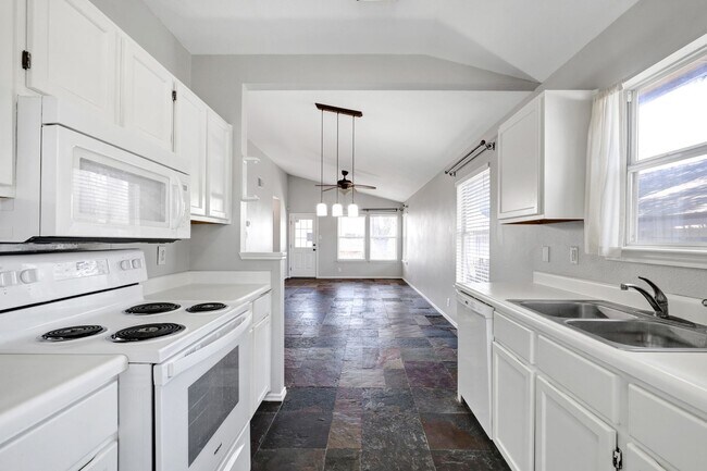 Building Photo - Carpet-Free Home with High Ceilings & Outdoor Retreat
