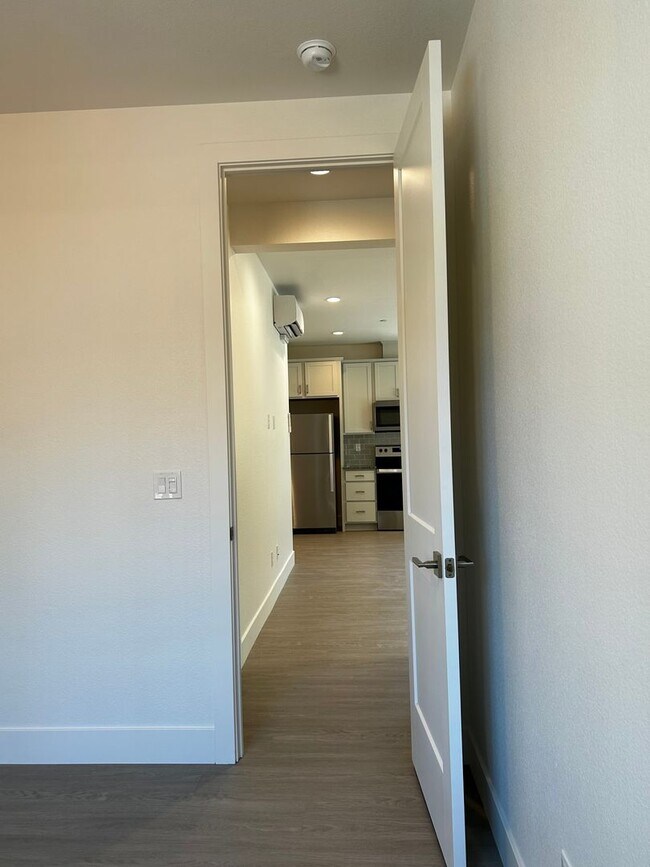 Building Photo - Coming soon! Lower unit  2 bed 1 bath townhome with attached garage